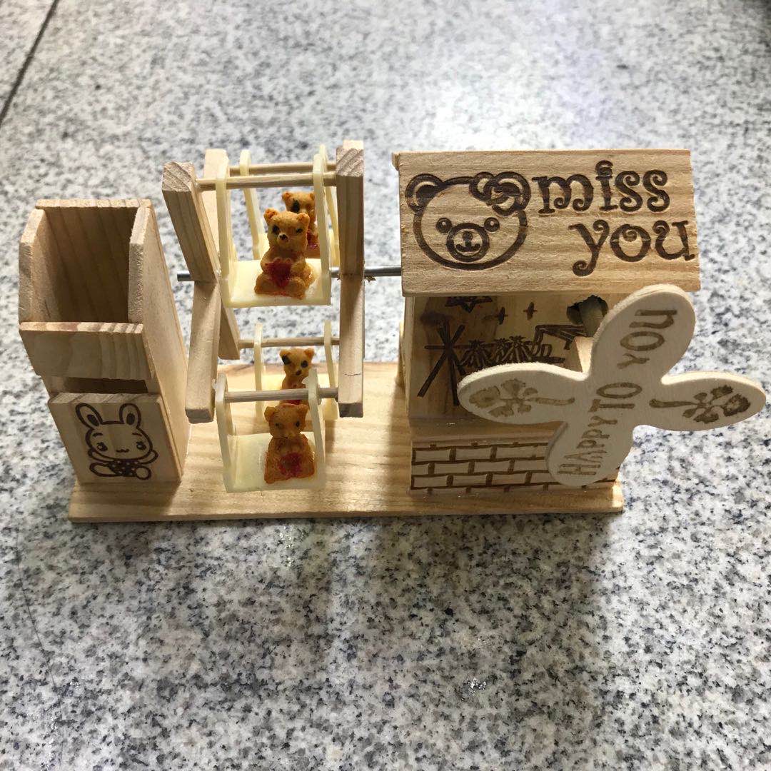 miss you, a family of wooden little squirrels, a large waterwheel with a house and a pen holder