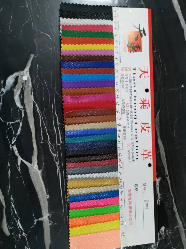皮革辅料面料厂家直销热销新款PU8003皮革大量现货箱包沙发装饰防水面料