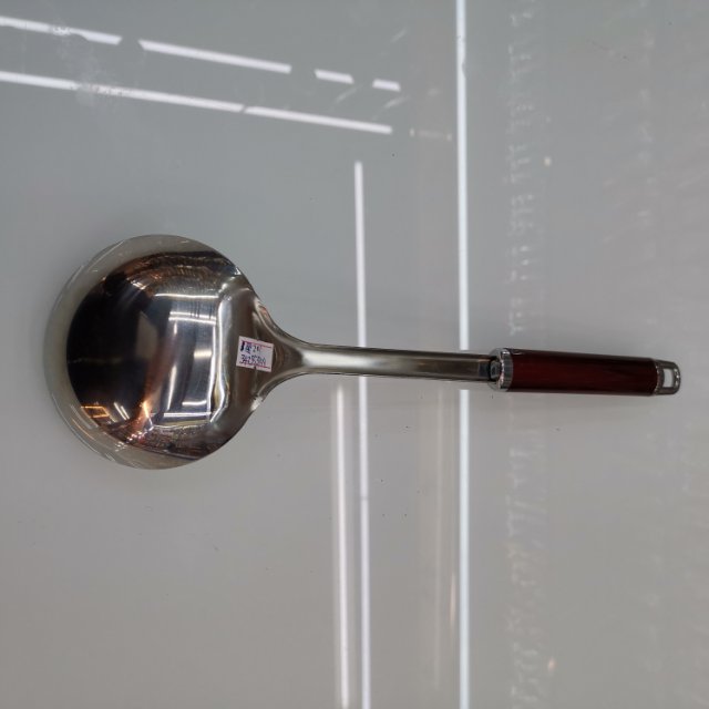 Colorful Handle Soup Spoon in use during cooking