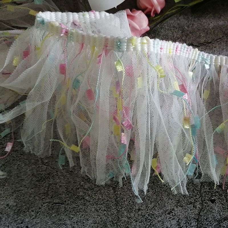 A super cute and fairy-like white macaron tassel and beaded children's doll lace mesh dress details Picture