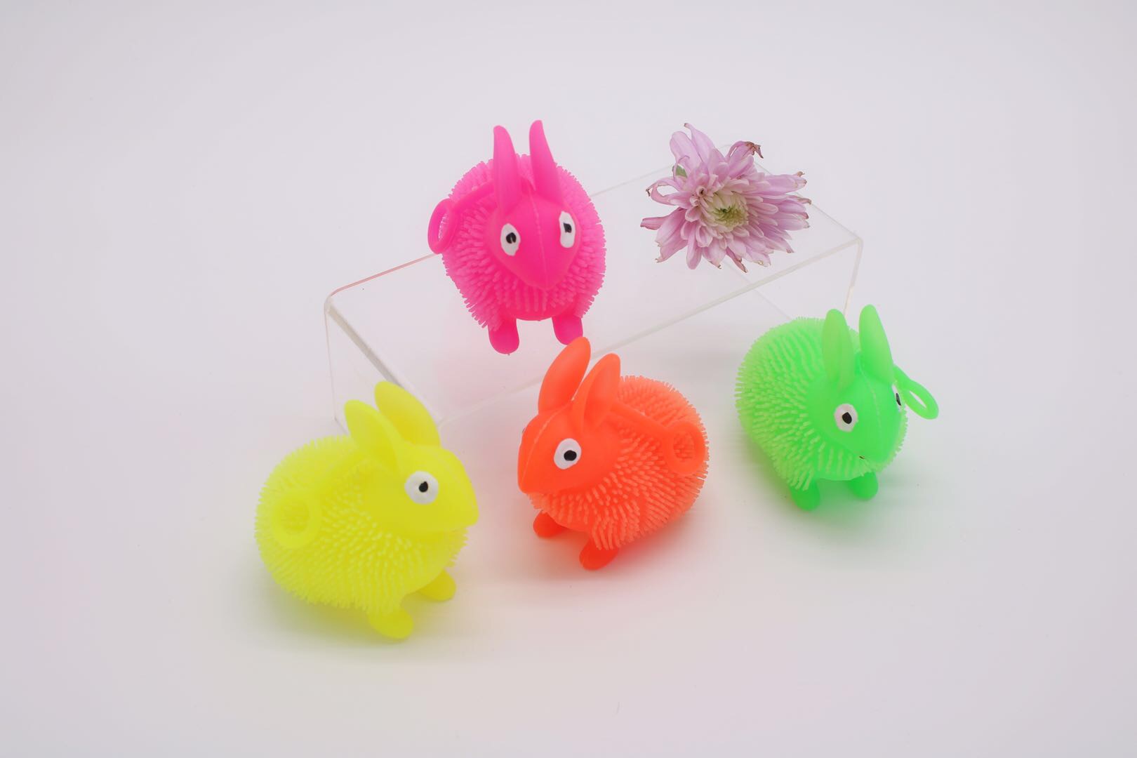 Elastic toy rabbit hair ball glows with soft glue to give off flash