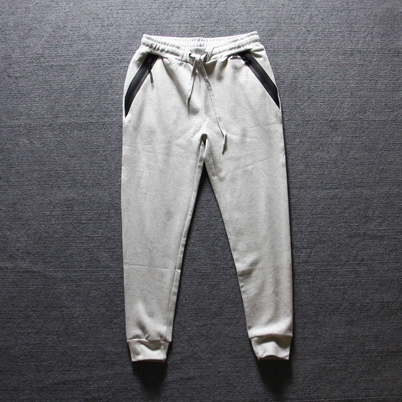 Waterproof embossed men's slim-fitting tight-fitting long pants, drawstring pants, sporty casual pants, space cotton knitted sweatpants details Picture