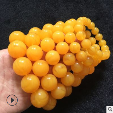 蜜蜡琥珀蜜蜡浮水荧光鸡油黄飘花精品圆珠桶珠手串