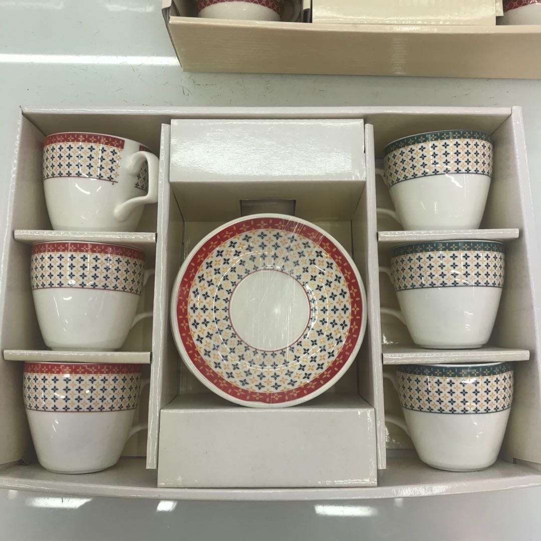 A set of 6 ceramic coffee cups and saucers, exclusively for coffee shops