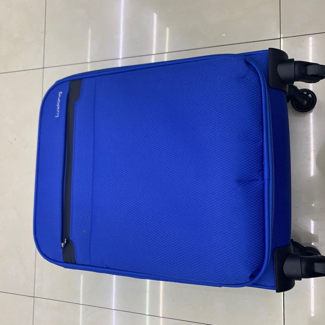 蓝色旅行箱三件套装花纹万向轮无锁行李箱图