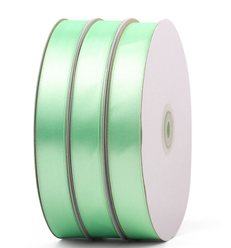 The cake box is decorated with ribbons and fresh flowers for baking packaging details Picture