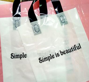 白色灰紫色男女装服装店手提袋塑料购物包装礼品童装袋子现货订做细节图