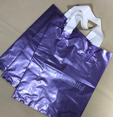 白色灰紫色男女装服装店手提袋塑料购物包装礼品童装袋子现货订做产品图