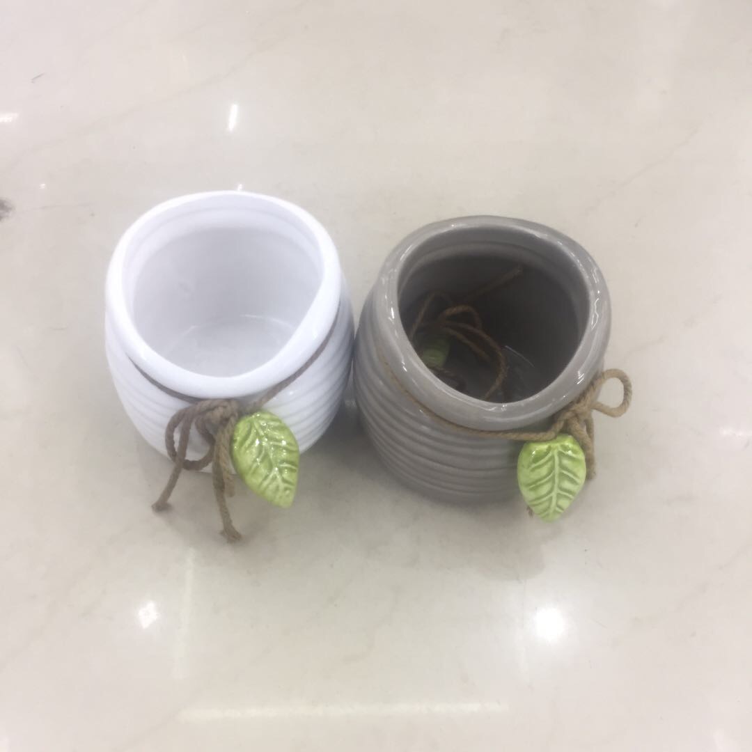 Flower POTS decorated with ceramic leaf bows thumbnail