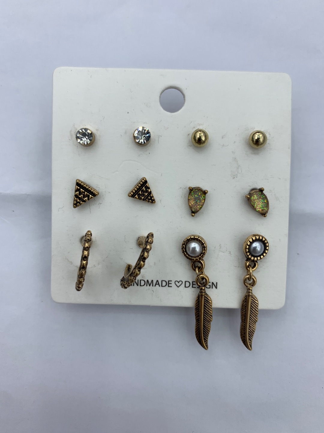 Simple joker style ladies ear studs thumbnail