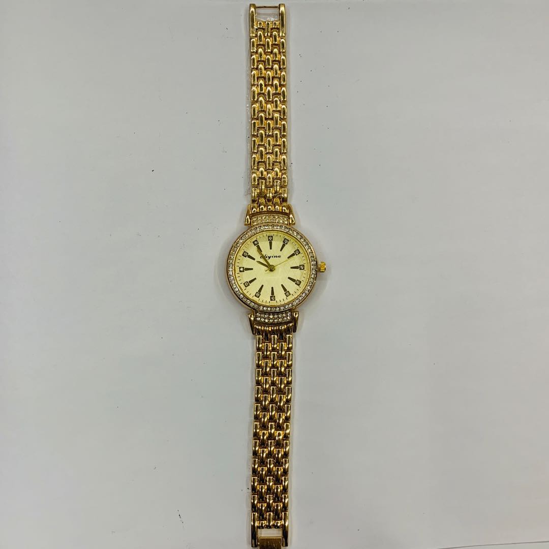 精美时尚环扣镶钻金属表带女士手表