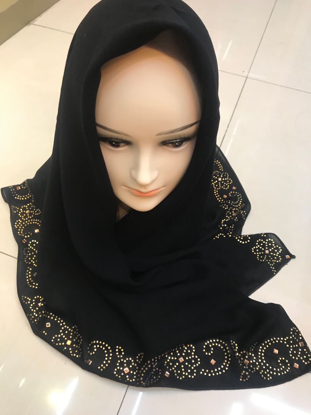 A fashionable and versatile casual chiffon headscarf with rhinestone edges for women