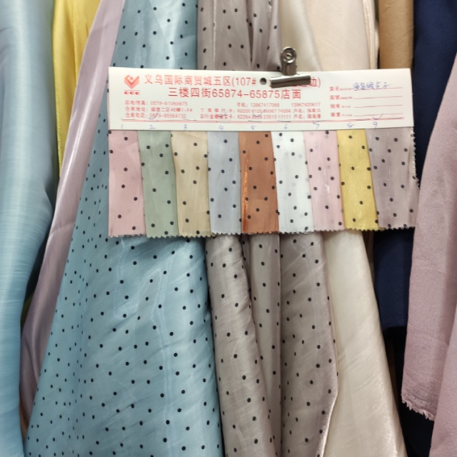 Island satin dot clothing fabric decorative fabric is available in a variety of colors