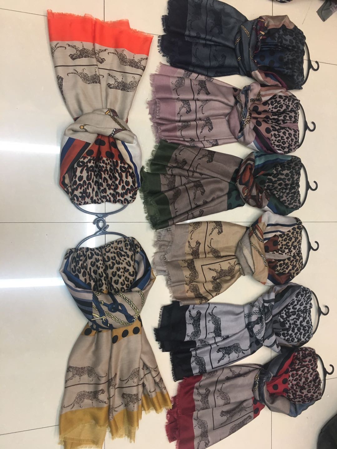 A trendy and popular women's scarf with thin satin polka dot leopard print Specification image