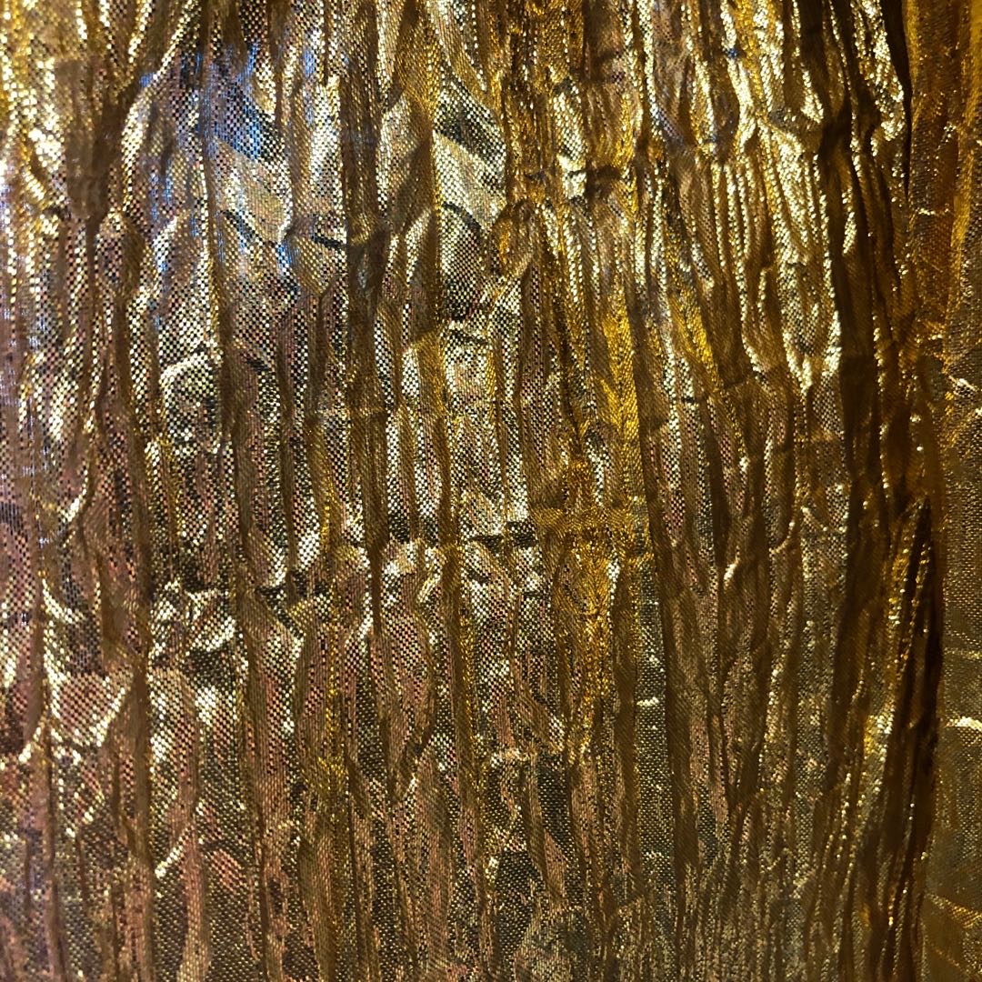 Gold and silver pleated fabric is available in multiple colors in stock. The fabric manufacturer sells directly. New products of the season are available for wholesale or retail details Picture