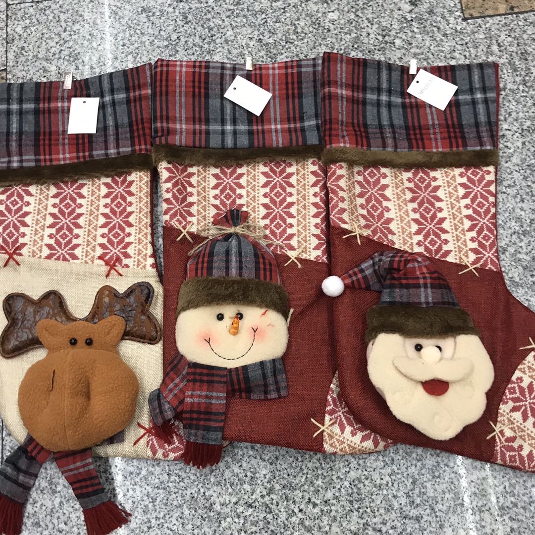 Christmas decorations, Christmas stockings, Christmas tree ornaments, shopping mall scene decoration props, gift bags details Picture