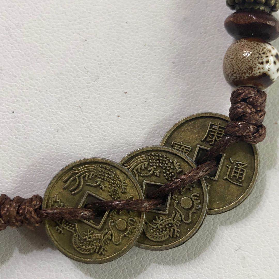 This retro copper coin bracelet exudes a sense of sophistication, retains color, is made of alloy, is versatile, anti-allergy, elegant, and is an eco-friendly piece that has become a hit on the Internet Specification image