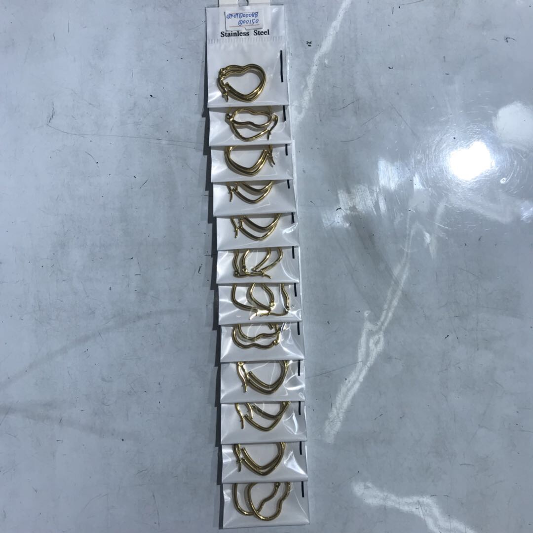 A few gold love stainless steel earrings with minimal ice thumbnail