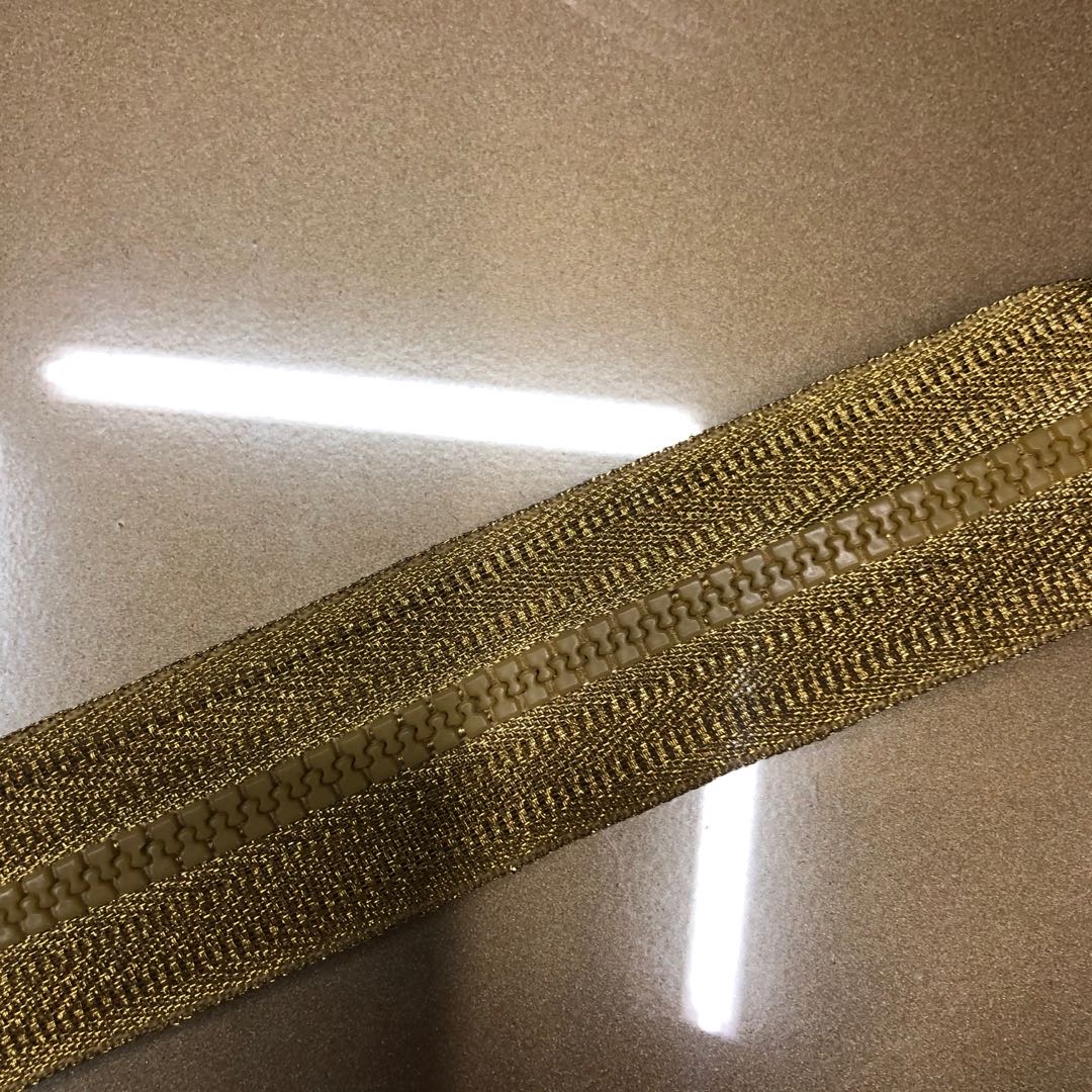高档YKK拉链3号亮金闭尾米色包袋钱夹领袖口裙腰服装辅料铜拉锁细节图