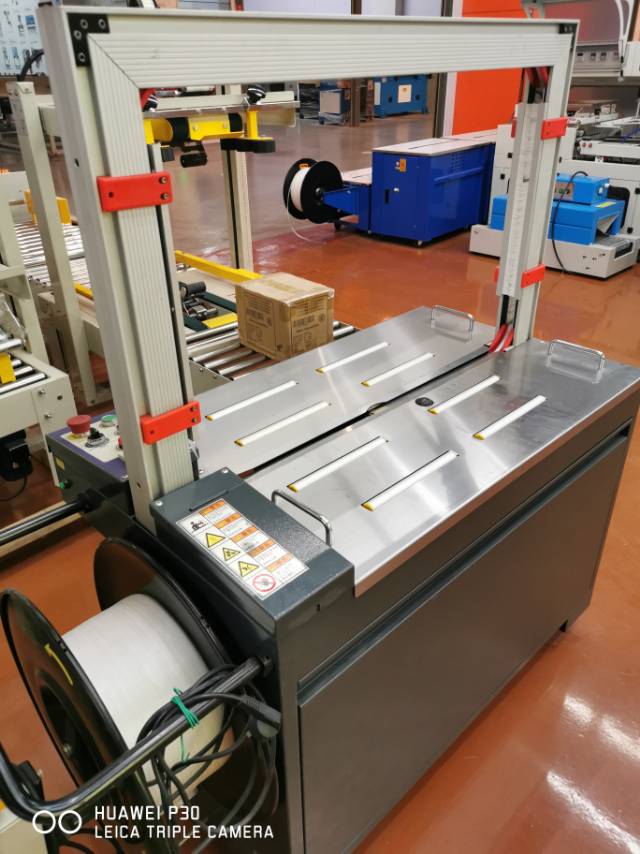 Fully automatic strapping machine