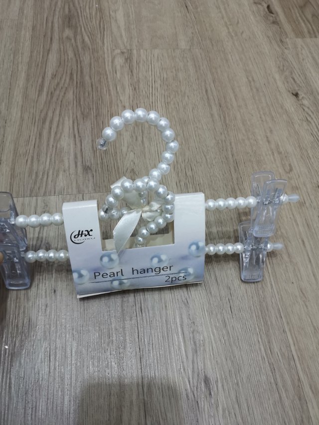 新款时尚环保珍珠衣架衣夹子牢固耐用图