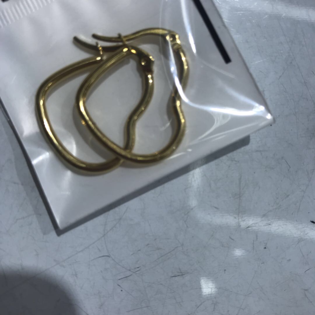 A few gold love stainless steel earrings with minimal ice details Picture