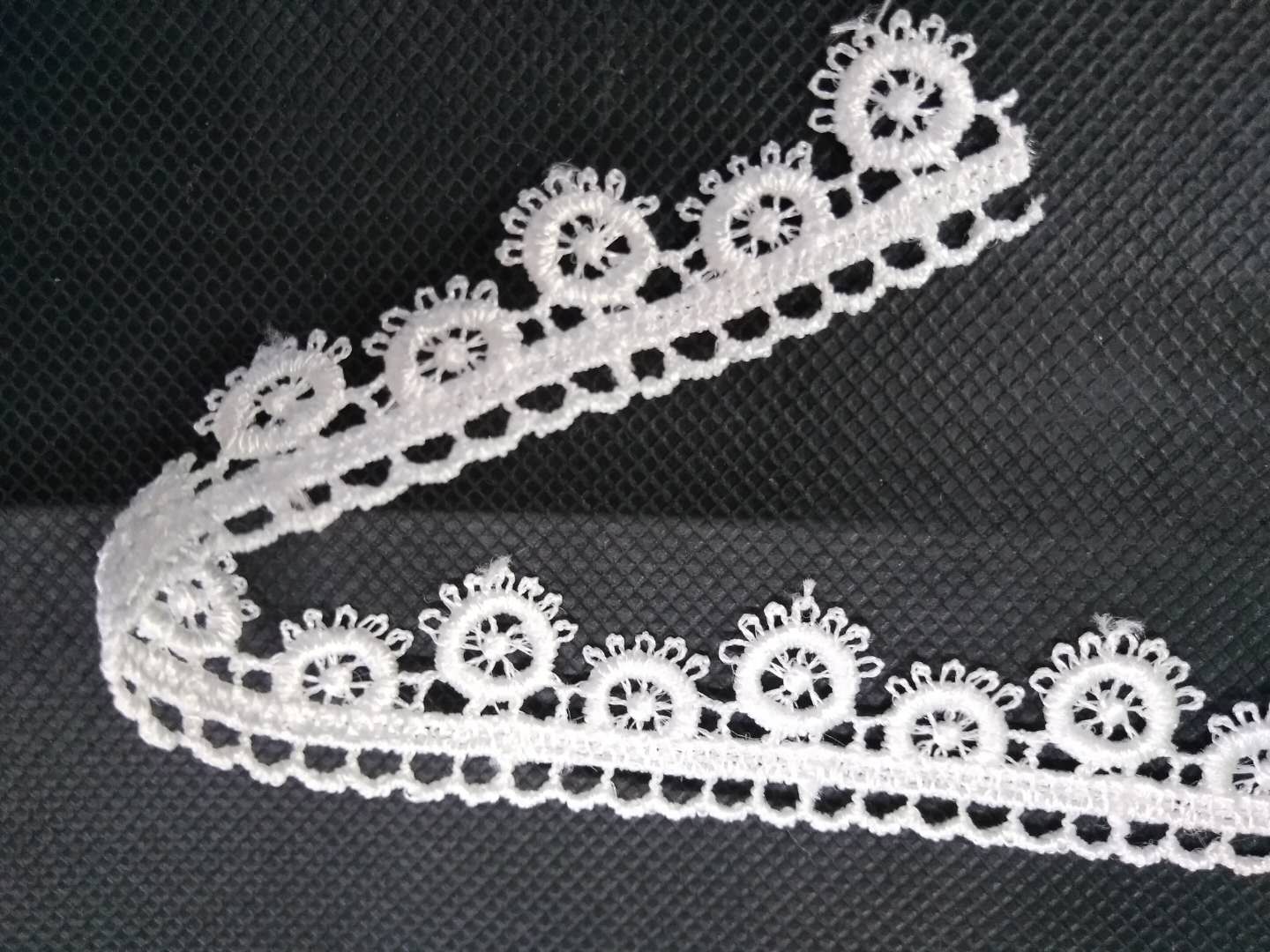 Wholesale of Wenzhou polyester filament lace, water-soluble embroidery lace, clothing, curtains, home soft decoration lace details Picture