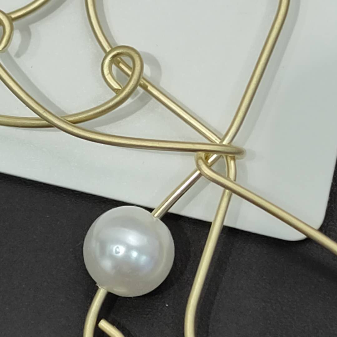 新款时尚气质蝴蝶结镶珍珠耳环气质耳环细节图