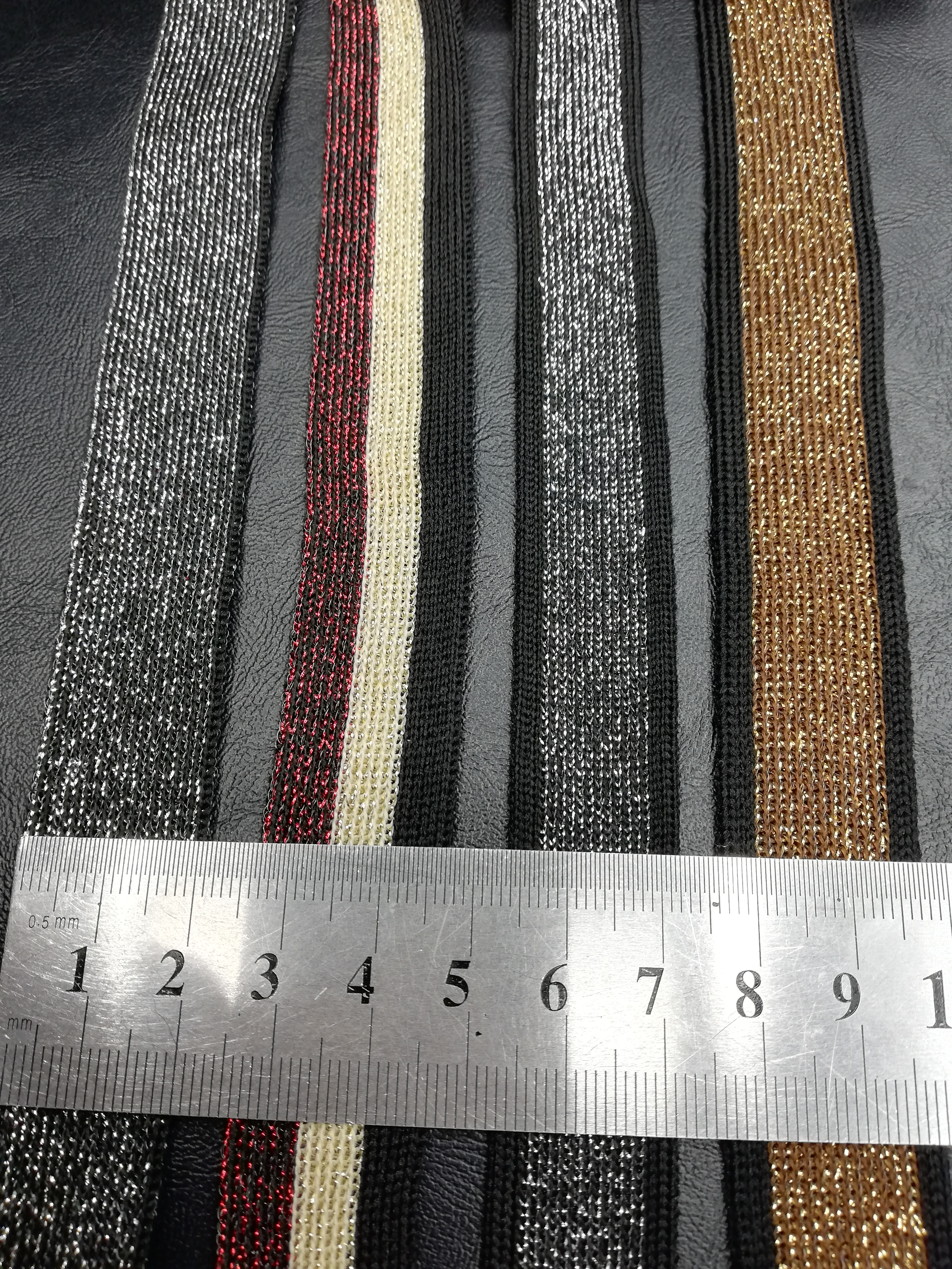 gold knitted webbing detail close-up