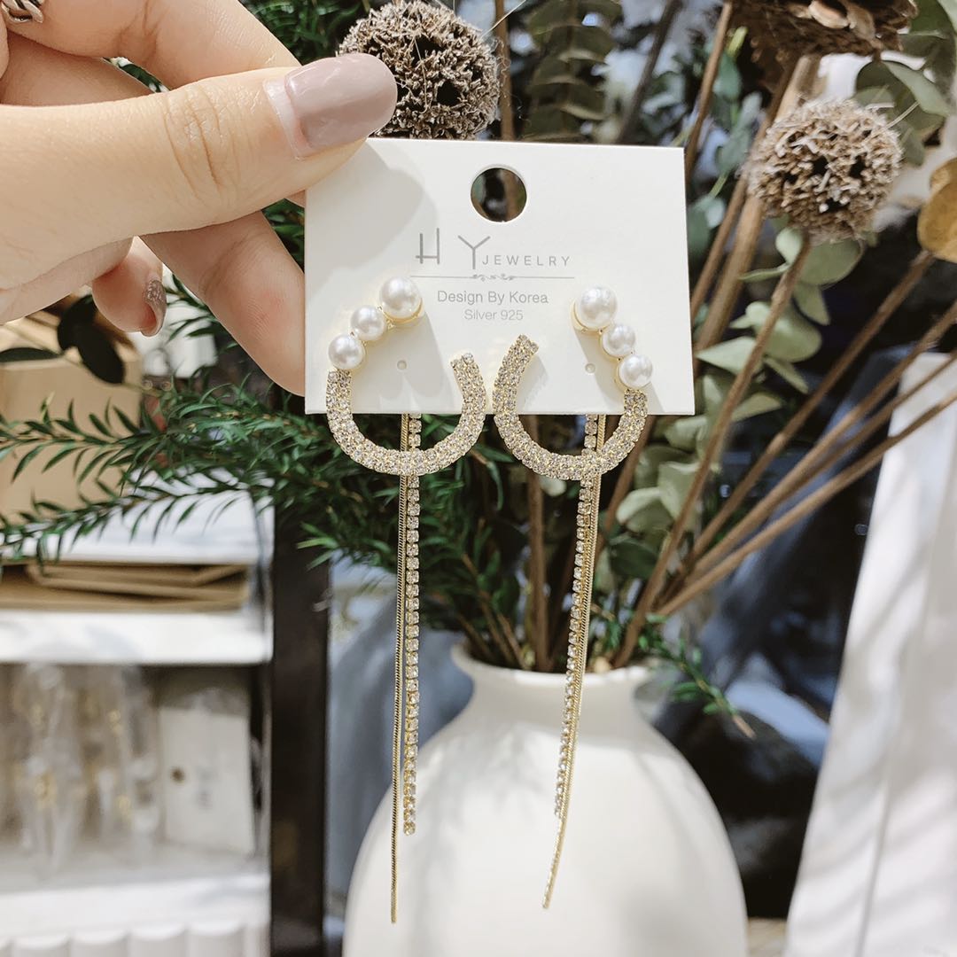 Versión coreana micro inserto largo pendientes de borla clip frontal y posterior perla moda temperamento influencer orejeras