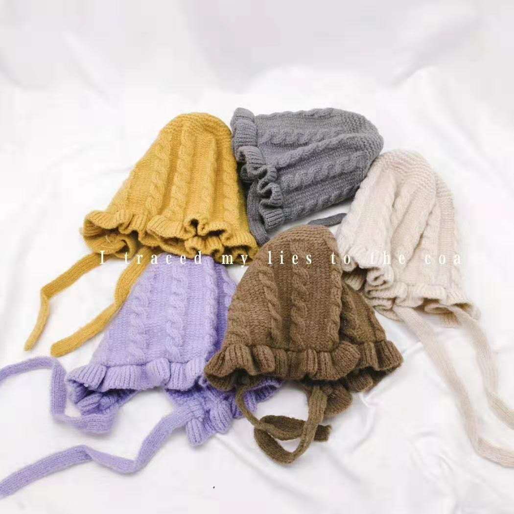 A fresh and simple lace tie solid-color children's knitted hat, warm and cute baby ear-protecting hat, woolen hat for autumn and winter