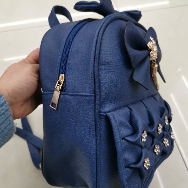 Venta directa de fábrica retro medium upscale women bag PU con taladro small school bag details Picture