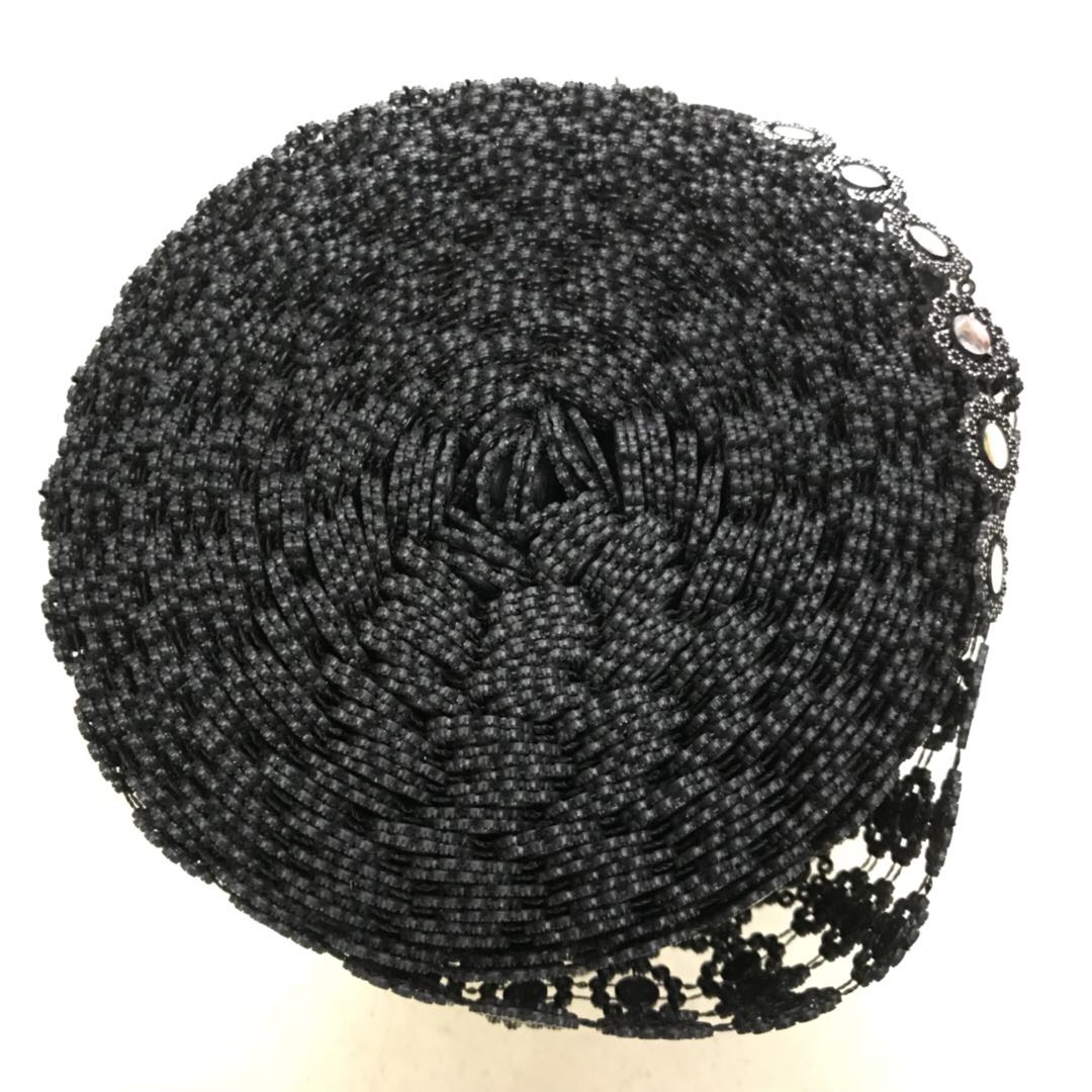 The clothing accessories feature a black base with patterned sequins and silver rhinestone trim details Picture