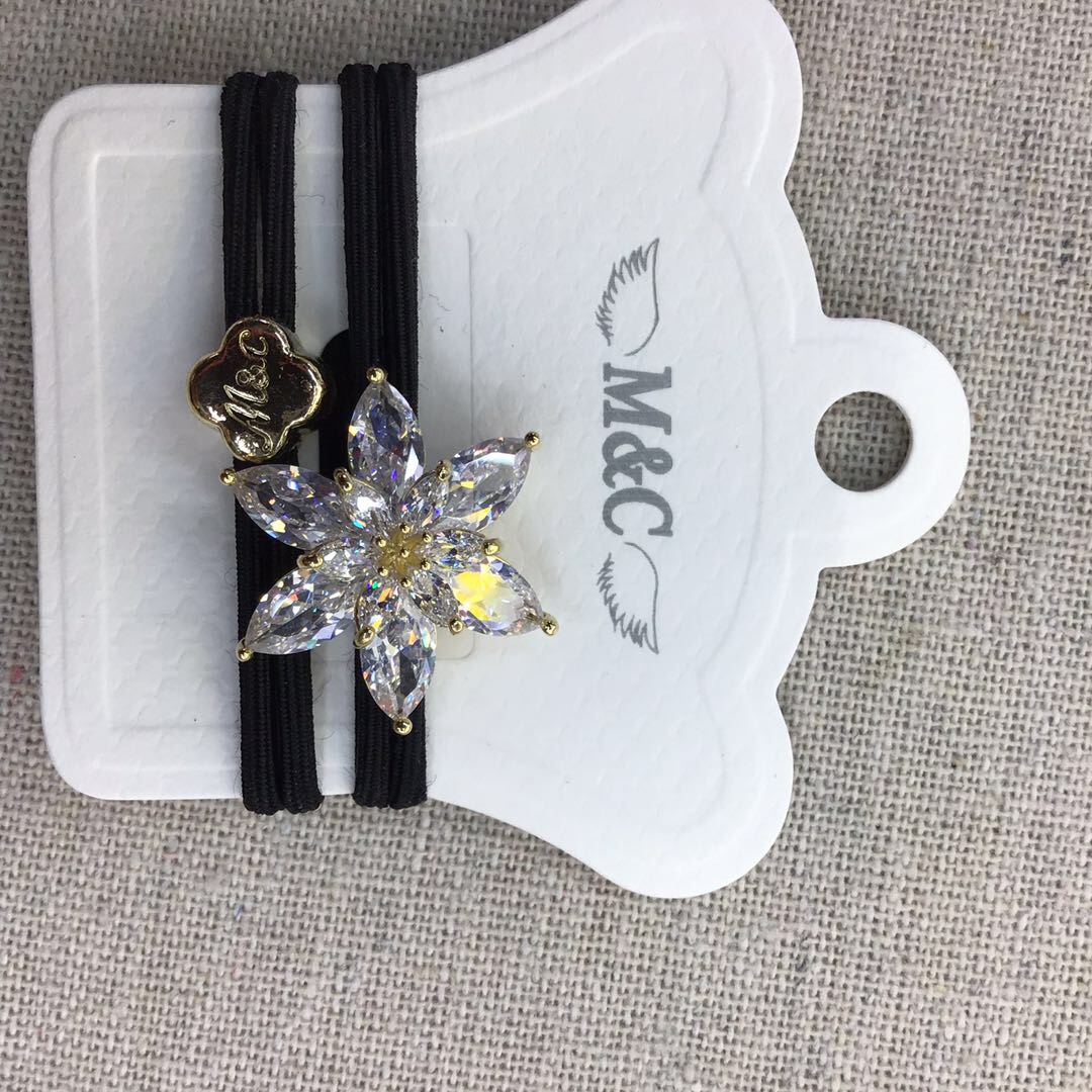 Korean style diamond-encrusted six-petal small flower double-strand nylon black rubber band Specification image
