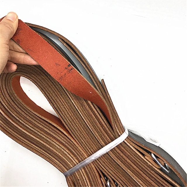 Close-up of metal wire buckle and leather texture