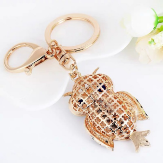 Exquisite and high-end car keychains with seven-color cat's eye stones, cross-border owl water diamond key chains for the Middle East, Europe and America Specification image
