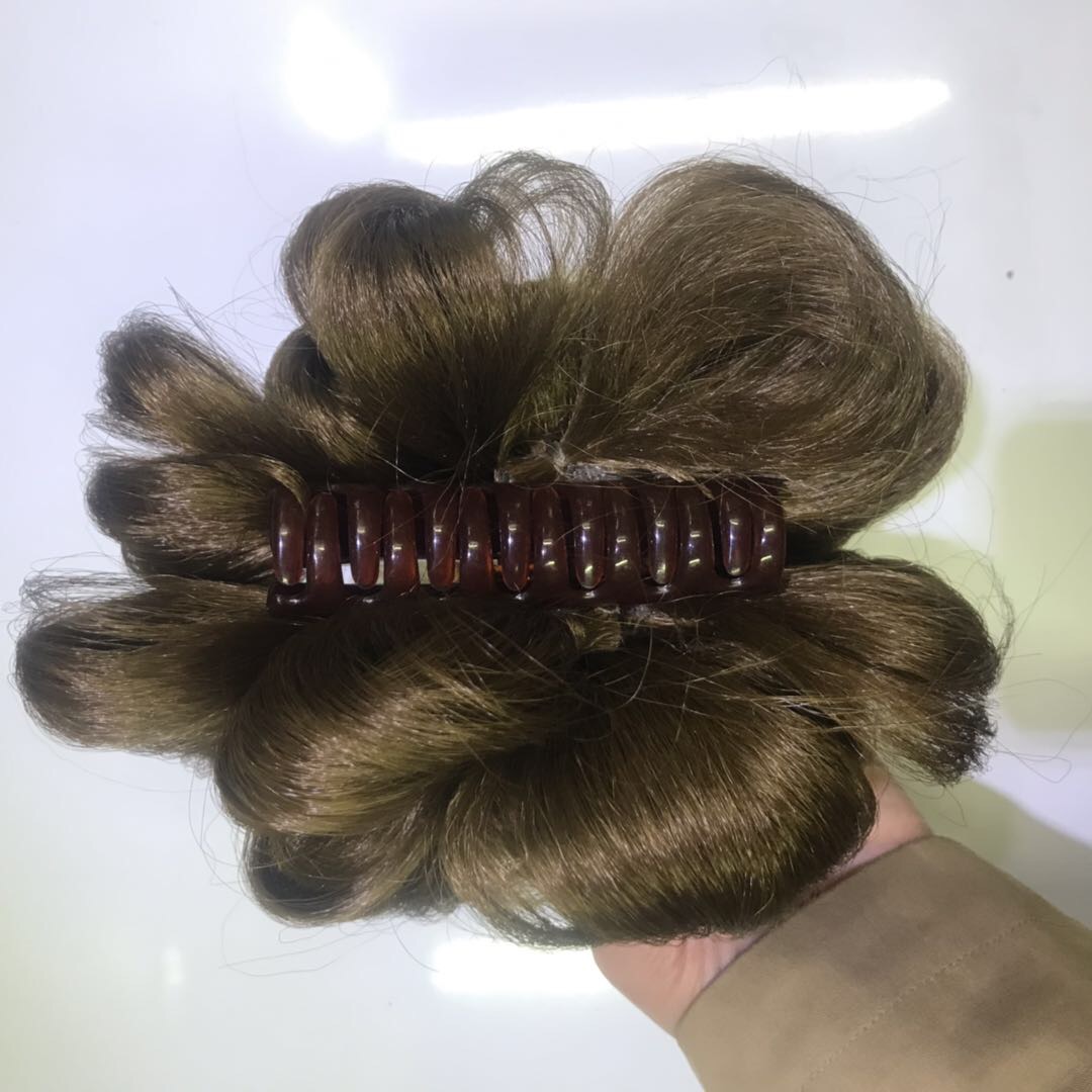 A synthetic fiber flower-shaped wig with a clipped ponytail accessory for ladies details Picture