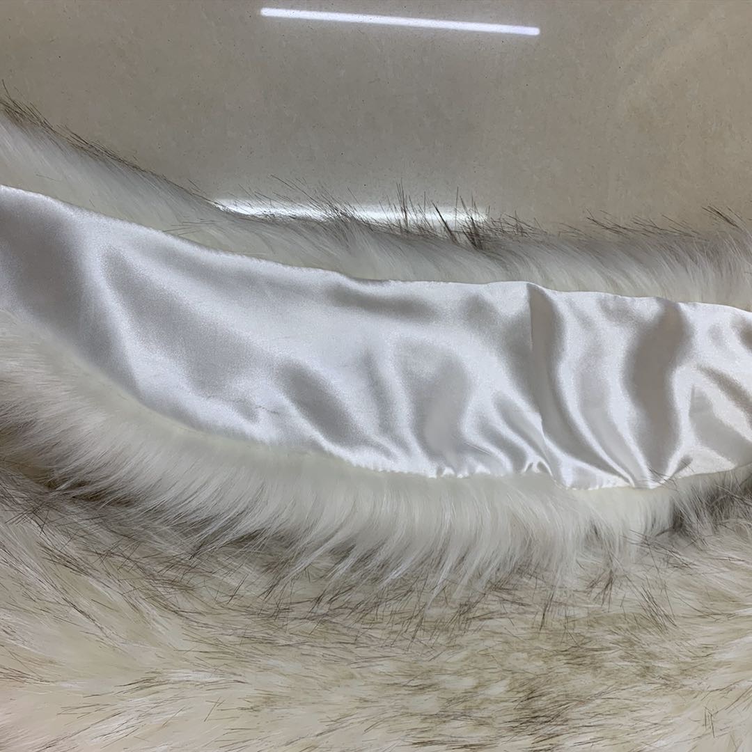 Close-up of textured simulation wool scarf showing soft weave