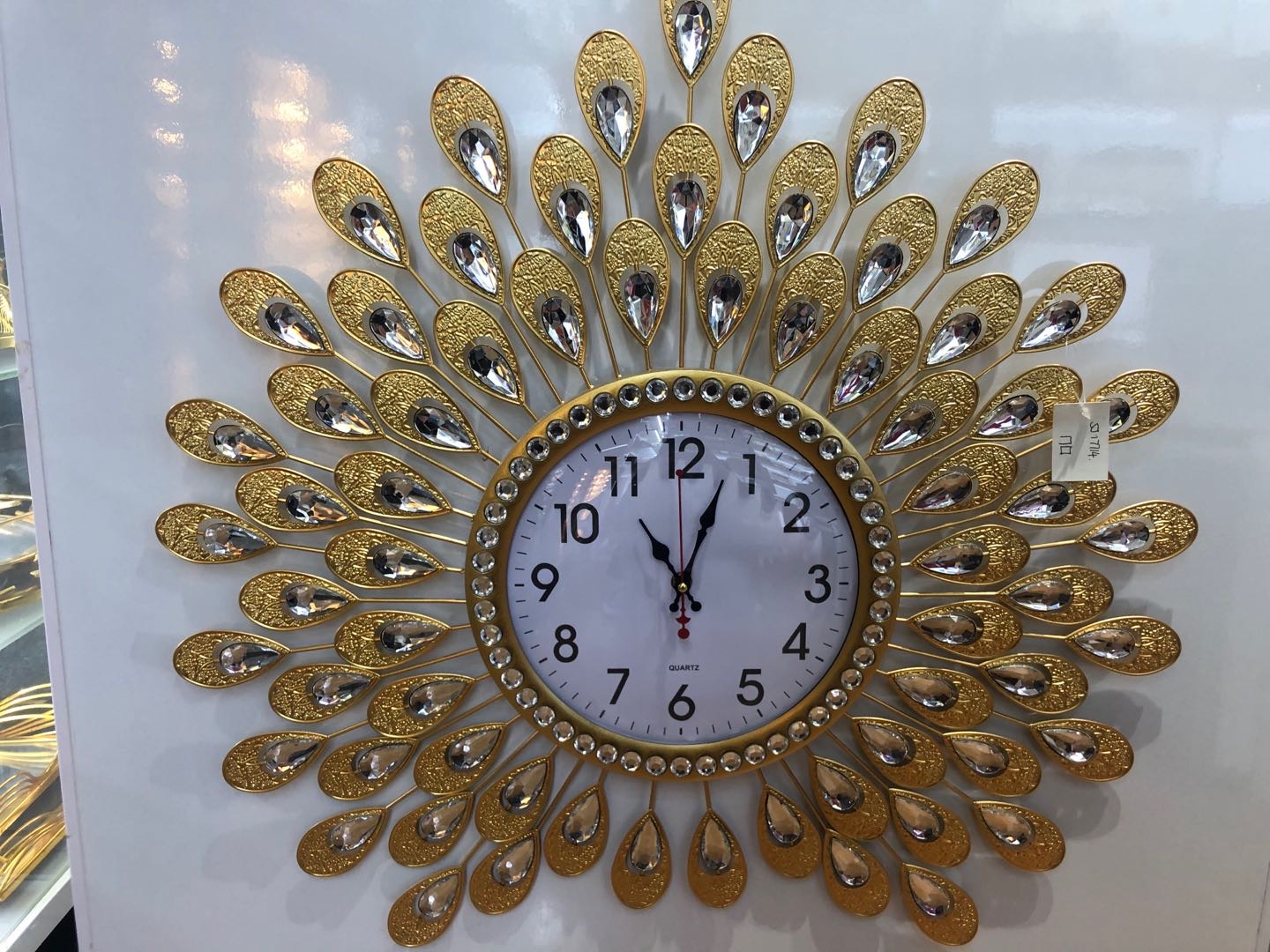 金羽毛水晶北欧创意钟表客厅挂钟现代简约个性装饰艺术时钟大气家用挂表