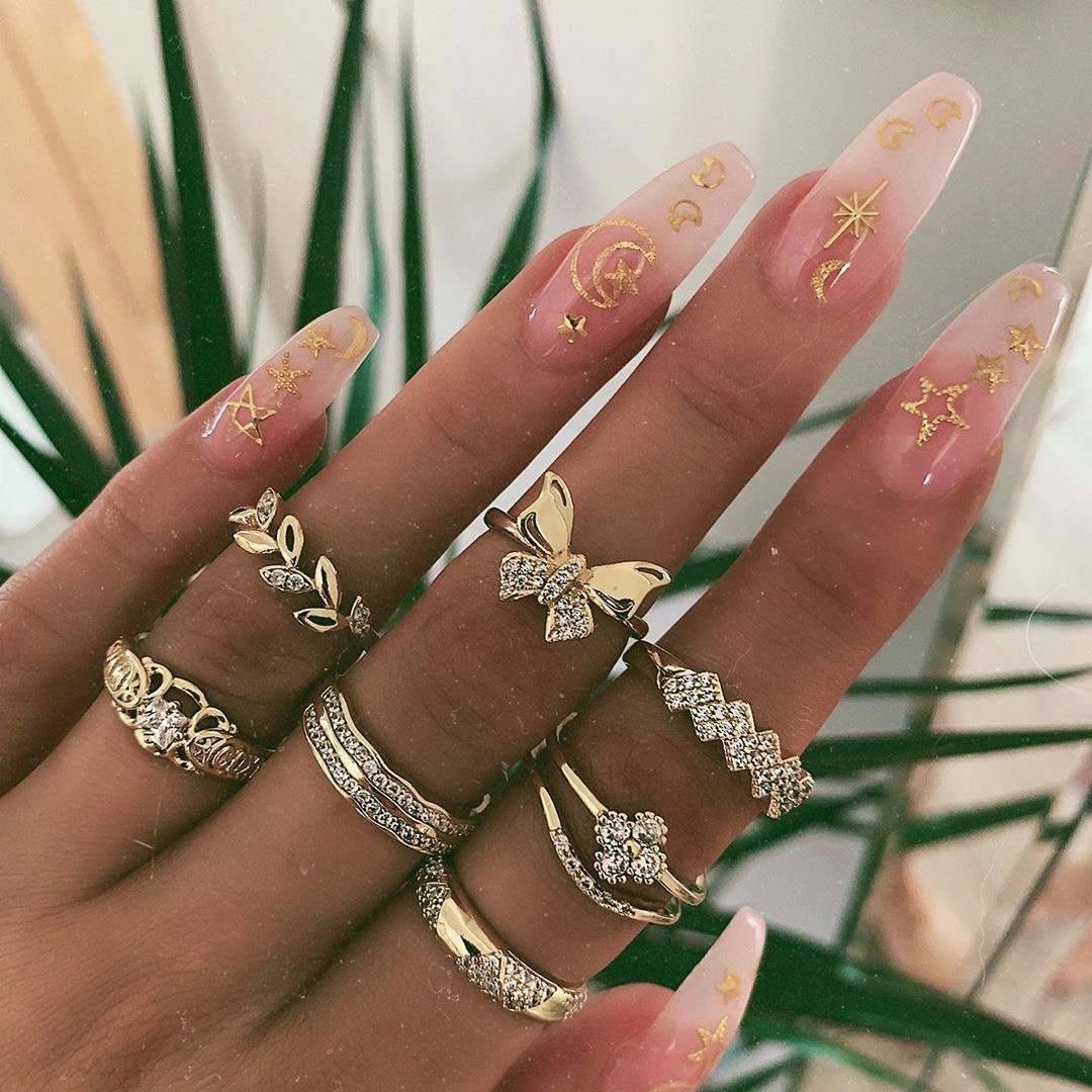 A collection of retro snake, elephant, rose, palm, leaf, silver and gold ring sets Specification image