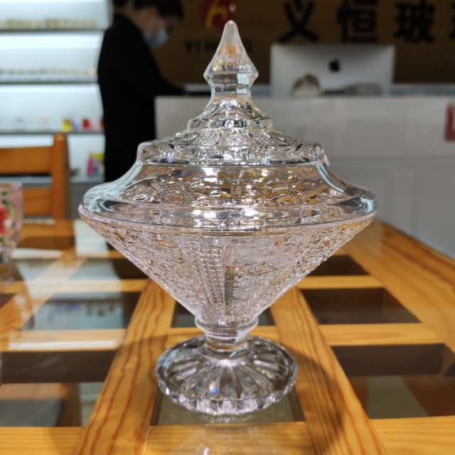 Pointed-top glass sugar jars are available in multiple styles and the price is negotiable