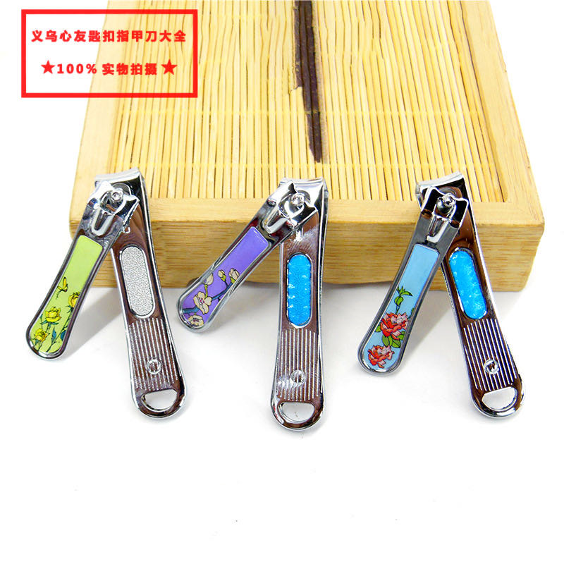 Small flat-mouthed rubber-coated nail clippers with notched patterns, 639 nail clippers in stock for wholesale details Picture