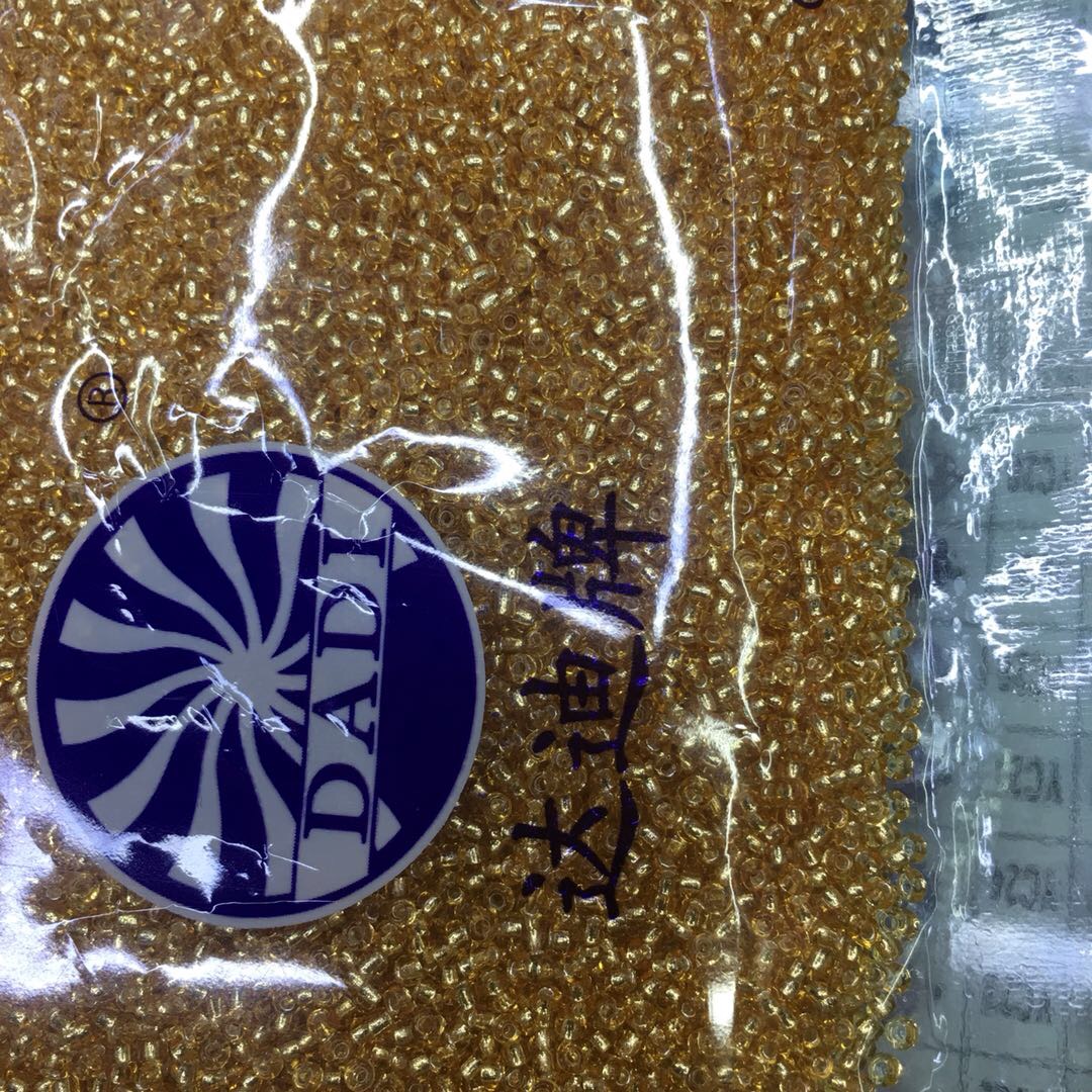 Factory direct sales: One pack of Dadi brand glass golden rice beads details Picture