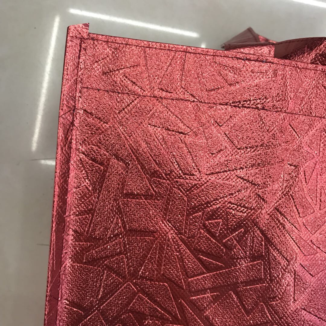 Factory direct sales of hand-held bright film faucet bags, three-dimensional bags, horizontal and vertical customized shopping bags details Picture