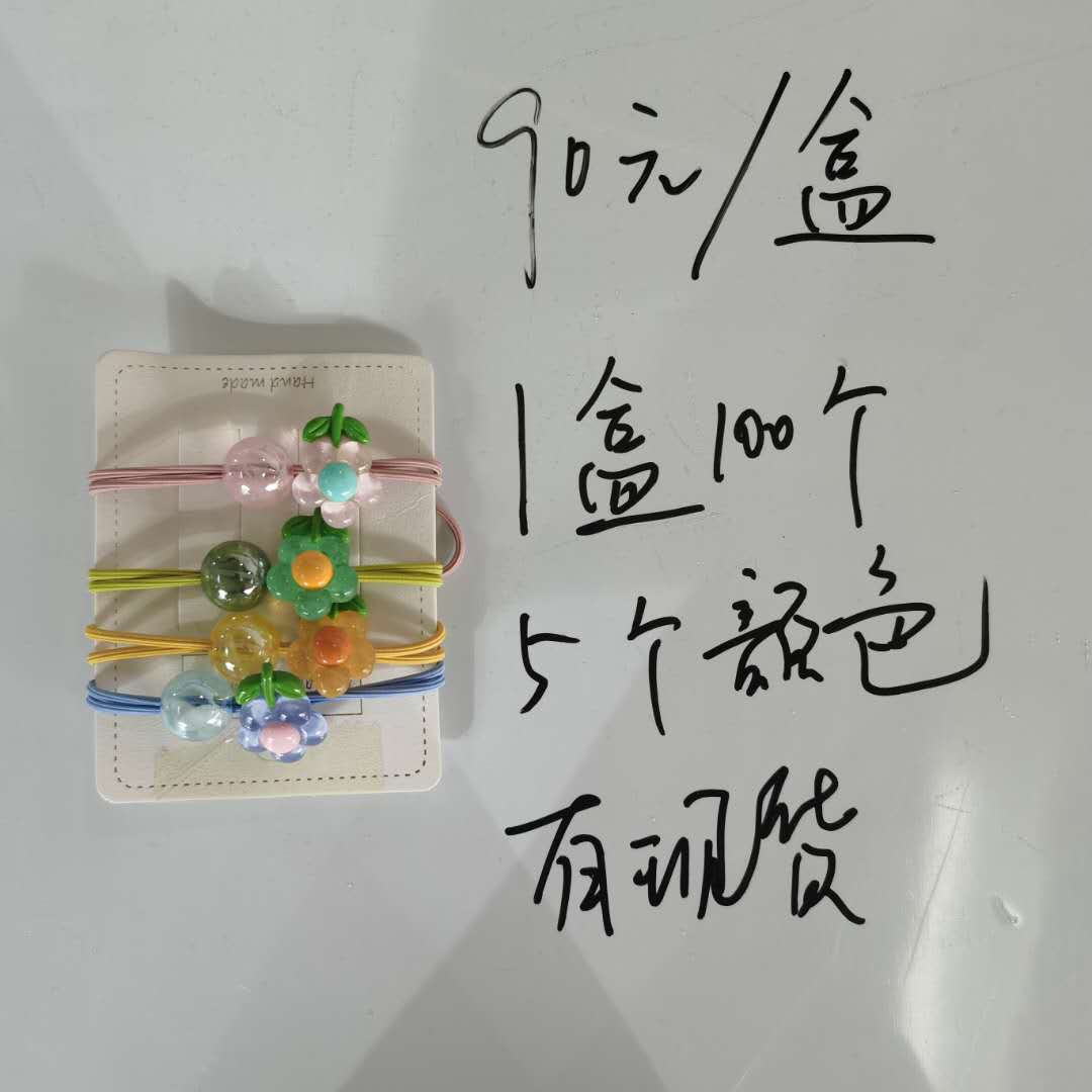 A new Korean-style fashionable ladies' versatile hair band in sunflower candy color with elastic bands