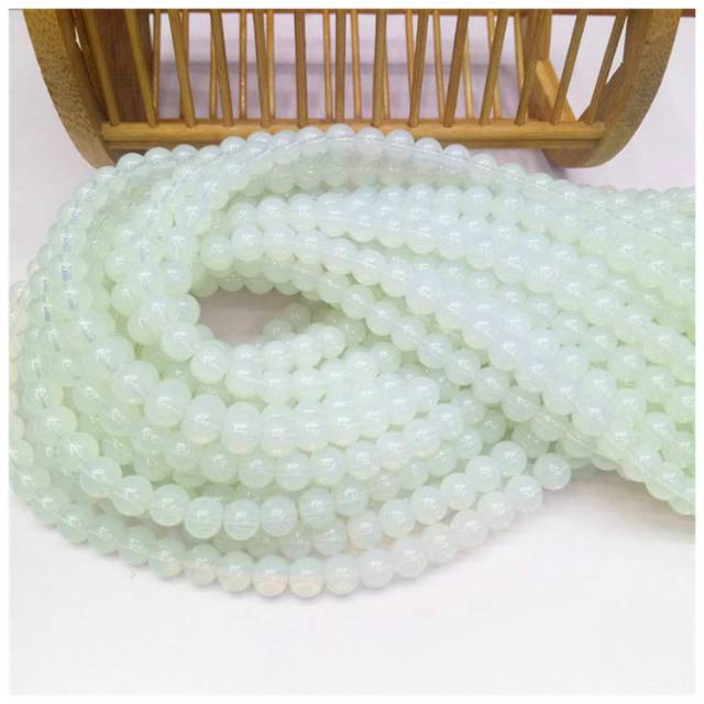 Guangshun Jewelry's Opal DIY White cat's Eye round bead jewelry and pearl matching factory Direct sales Specification image