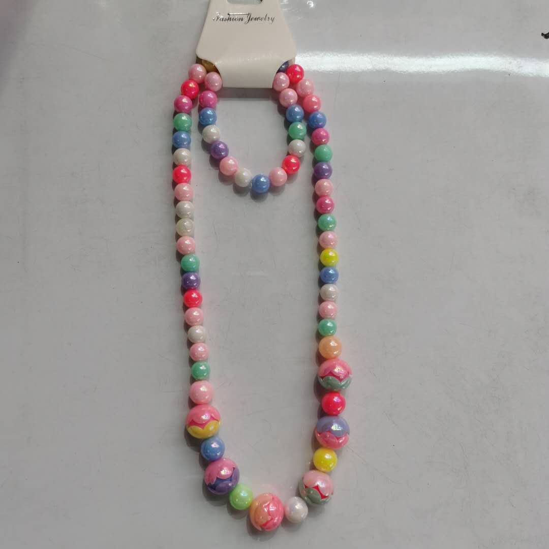 A fashionable and popular children's accessory, a colorful bead necklace for little girls details Picture