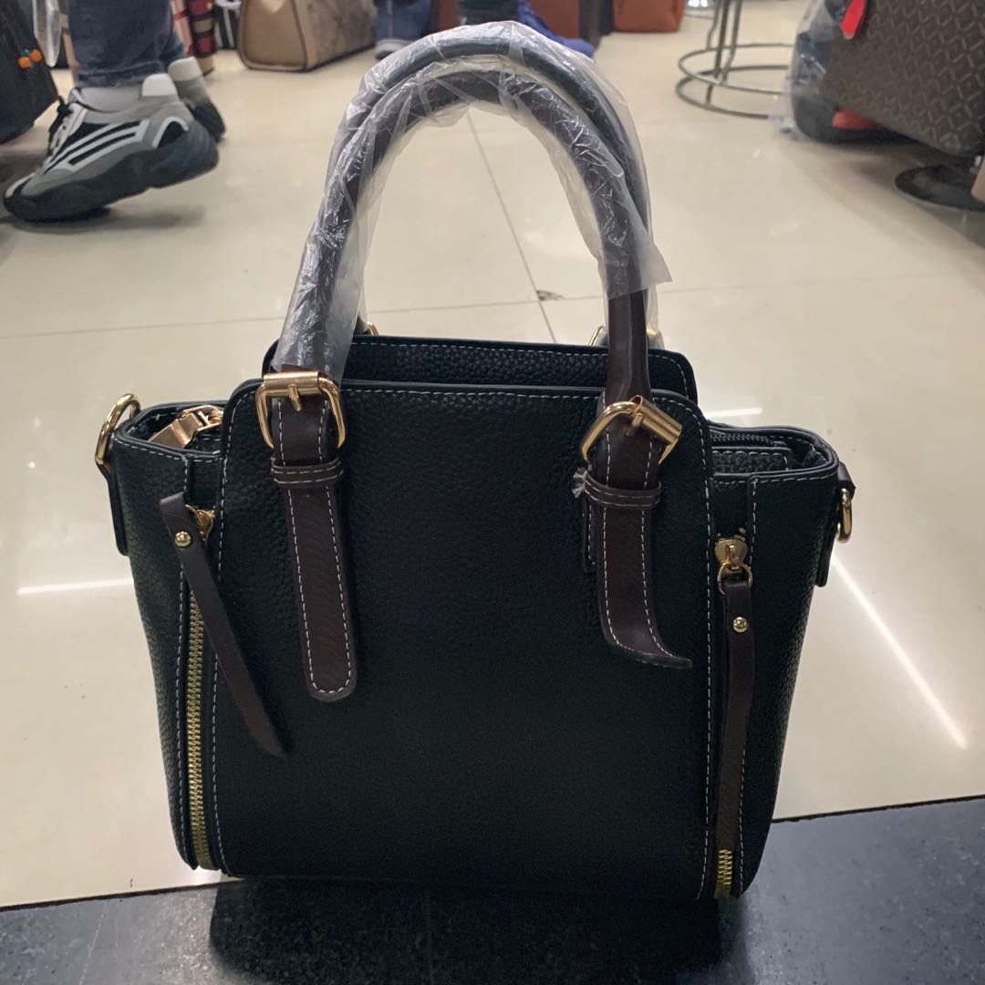 Black handbag bag bucket bag leather satchel black hair hair style thumbnail