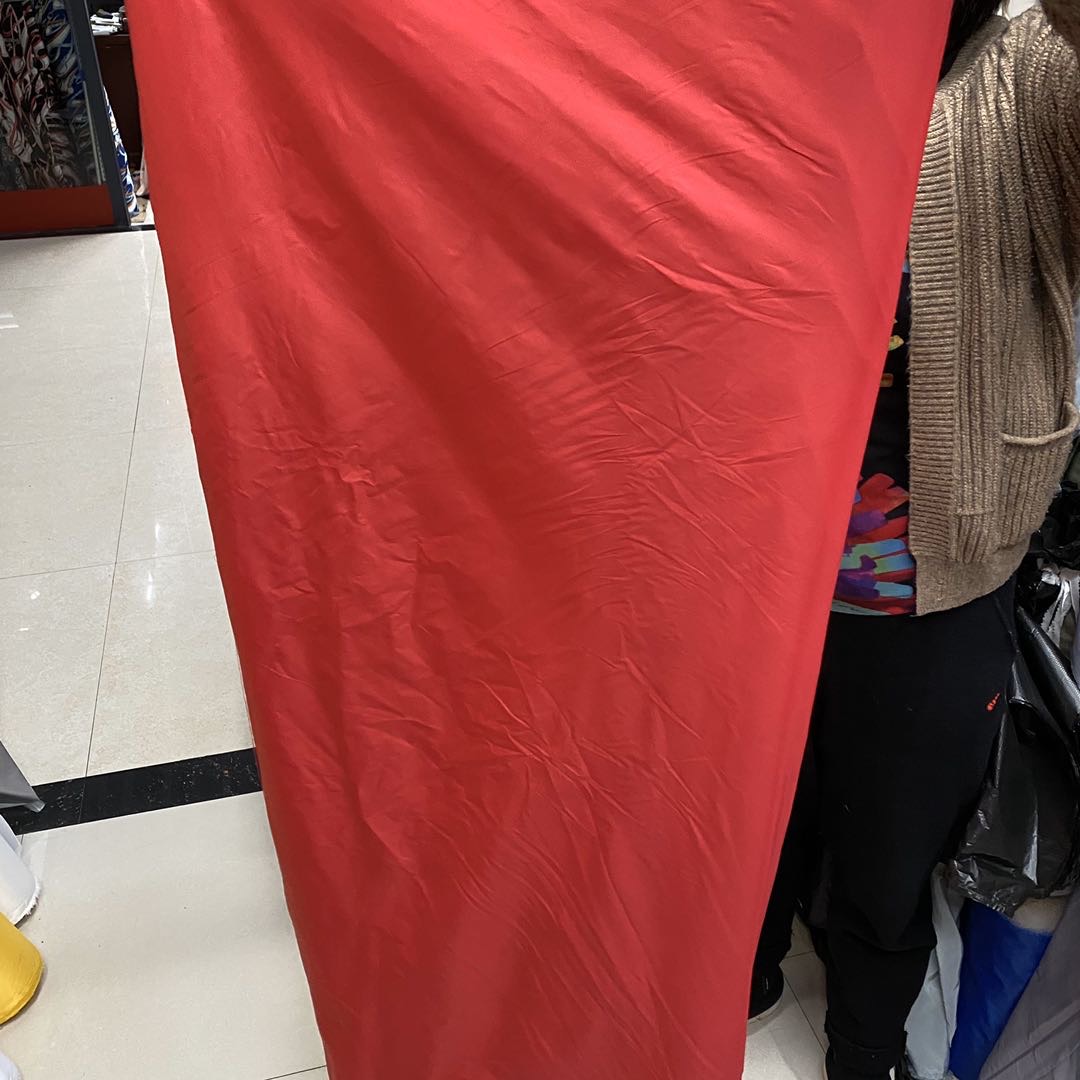 This is a high-elasticity nylon fitness yoga fabric with a nude-like feel and quick-drying nylon Lycra in stock. It is a knitted sports fabric