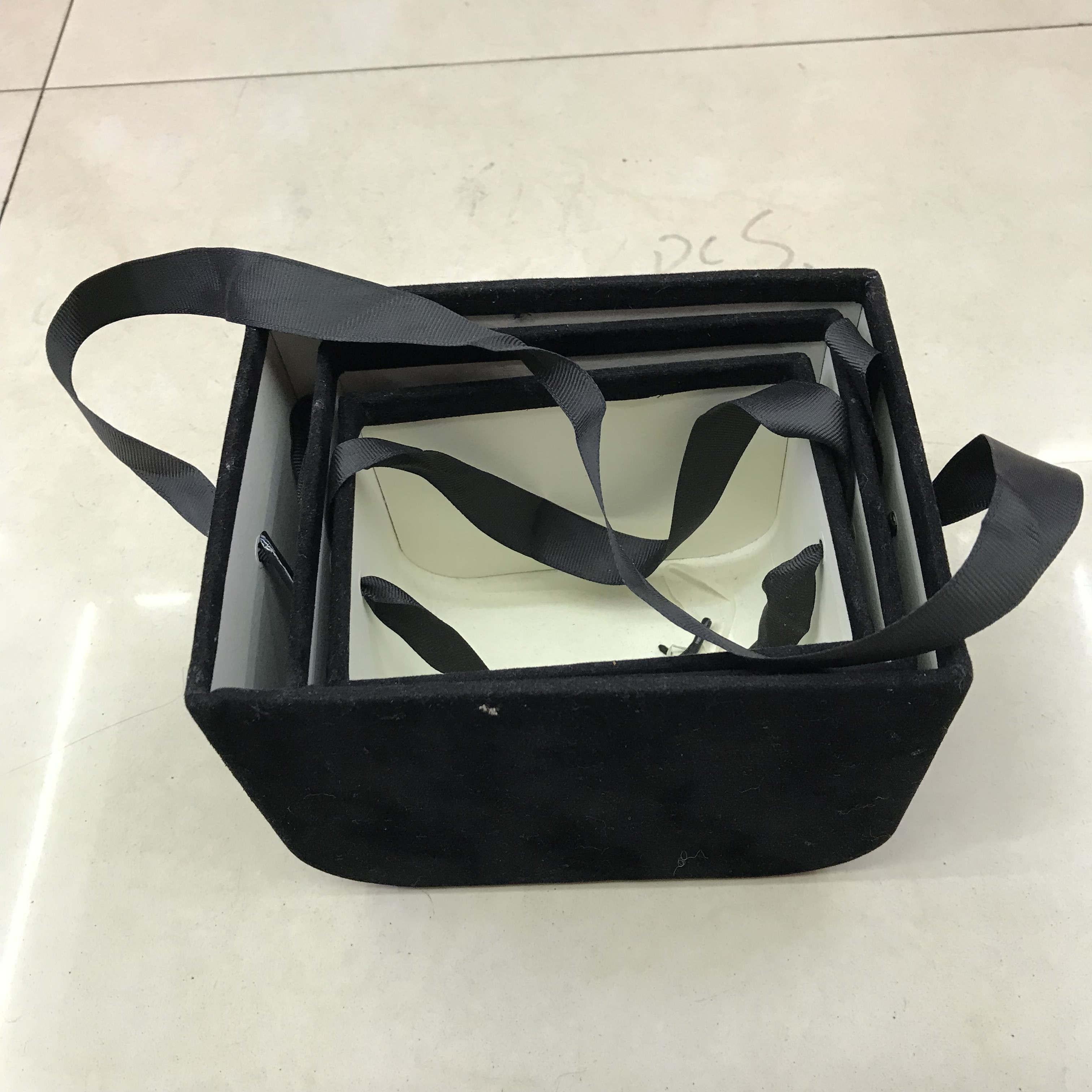 Black Flannelette Circular Edge Box on a modern desk